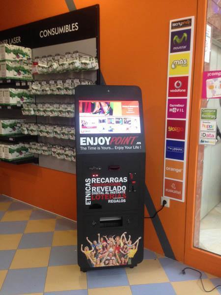 Kiosco digital EnjoyPoint: fotos, canalización lotería, recargas, revelado…