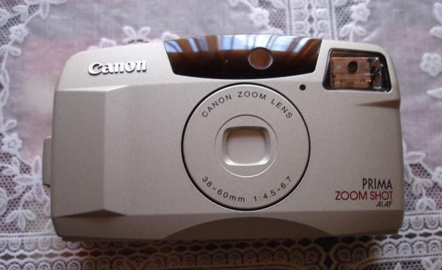 antigua camara de fotos  cannon zoom lens