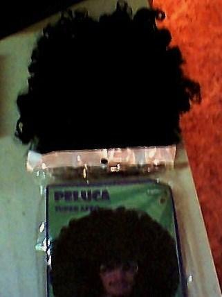 peluca afro.negra.