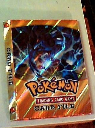 pokemon-album con 43 cromos.