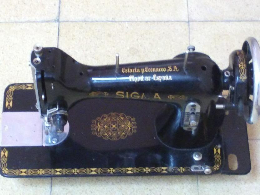 Vendo maquina de coser sigma