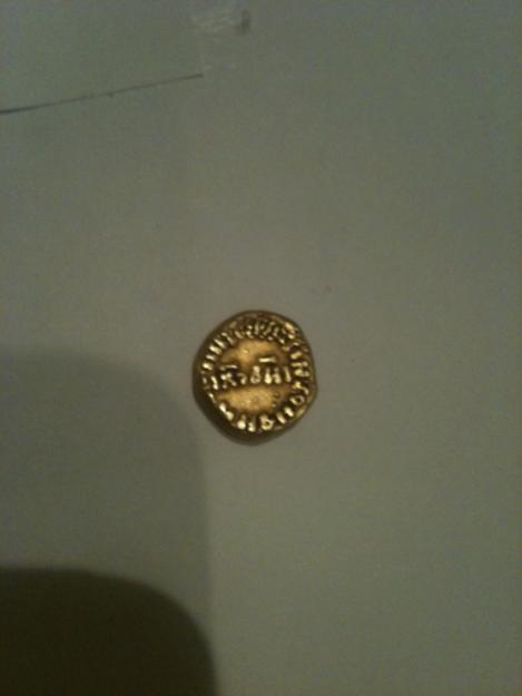 moneda de oro antigua
