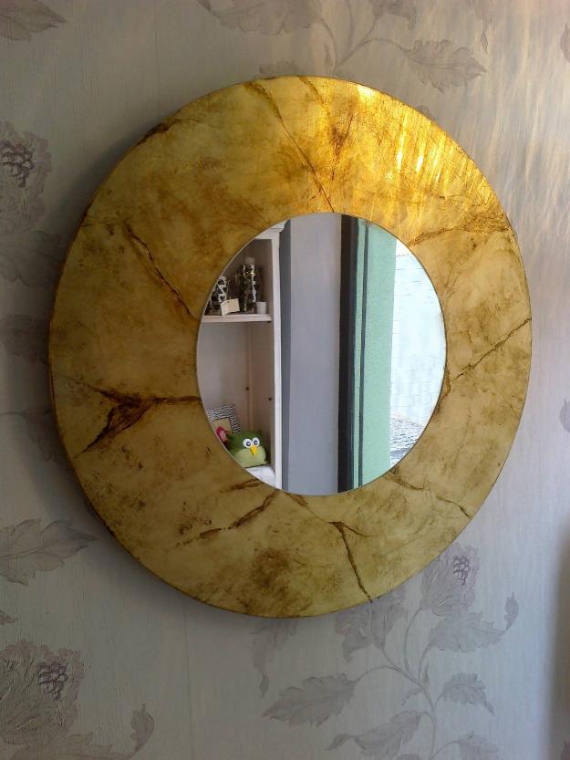 Espejo de diseño artesanal laminado en pan de oro