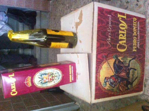 caja de 12 botellas Brandy Carlos I solera especial pedro domecq sello de 4 pesetas