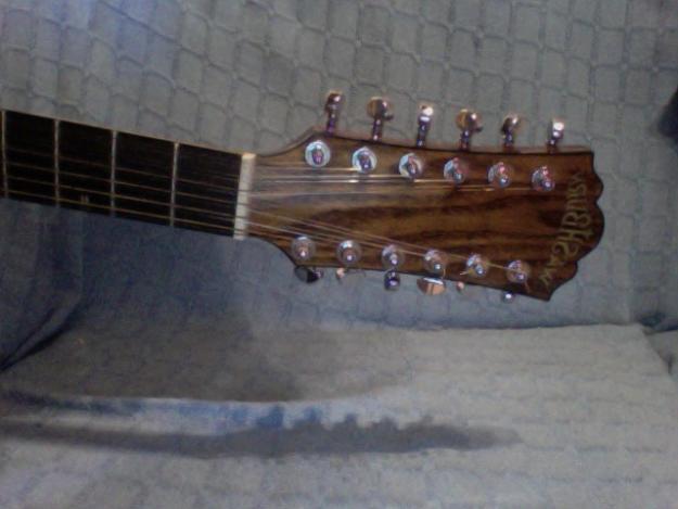 Guitarra Washburne 12 cuerdas electro-acustica con afinador incorporado 350euros
