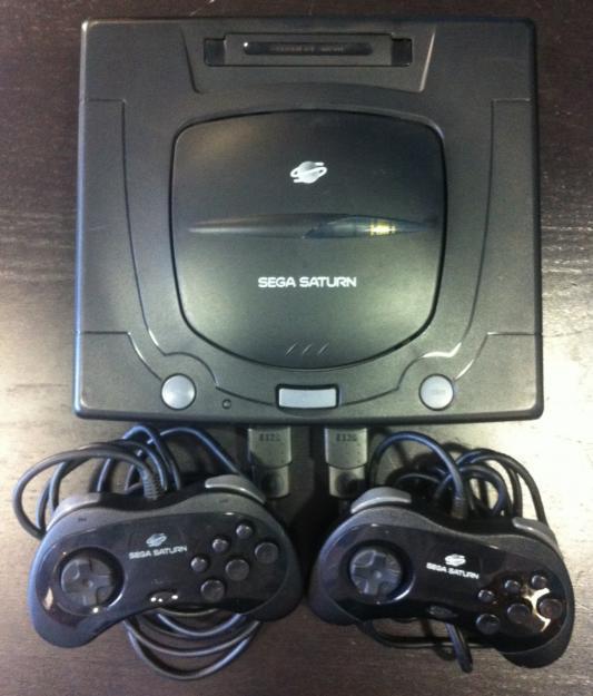 Sega Saturn MK-80200A﻿, con 2 mandos y cables. Lector CD Yamaha.