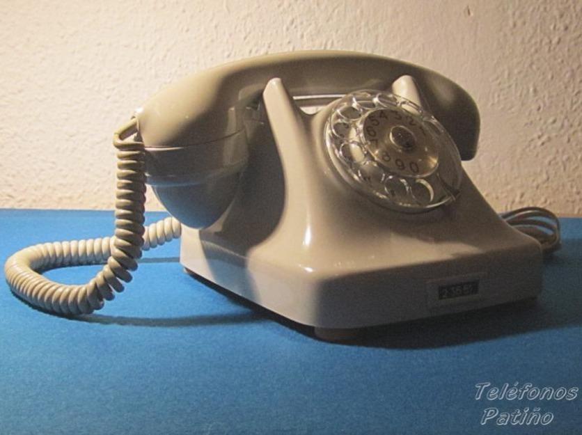 Teléfono antiguo de sobremesa perla