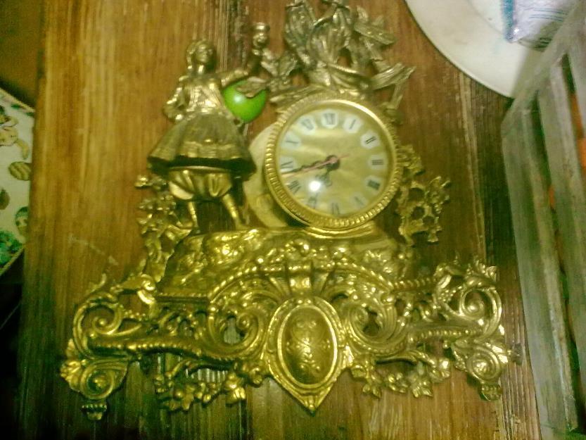 reloj antiguo de bronce