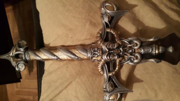 Espada de plata ,bronce,y acero inoxidable